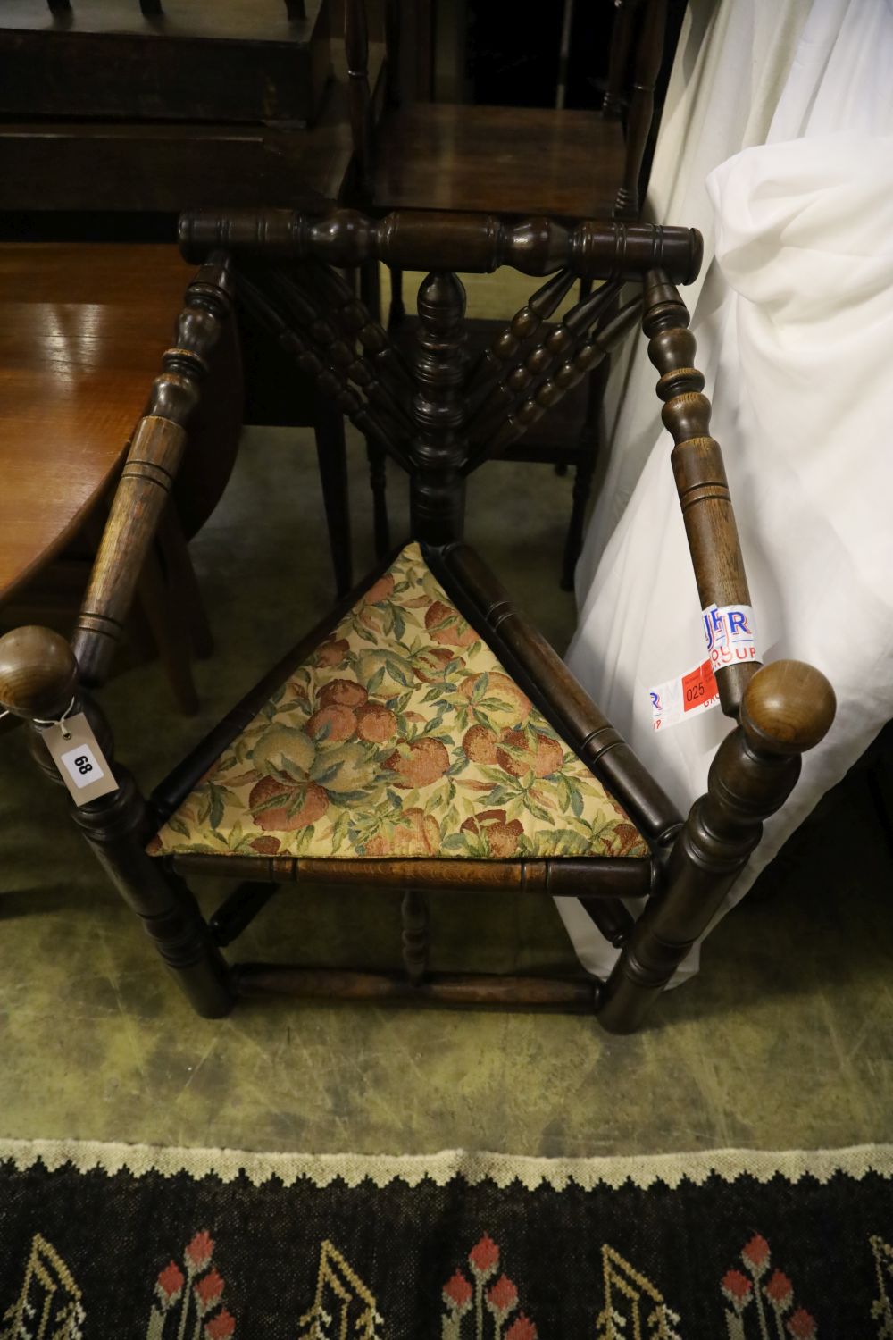 An oak Turners chair and a warming pan